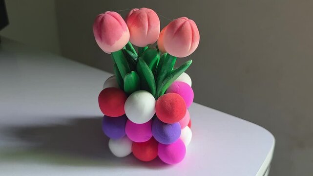 Adorable clay tulip bouquet in colorful spherical vase handmade craft animation clay tulips