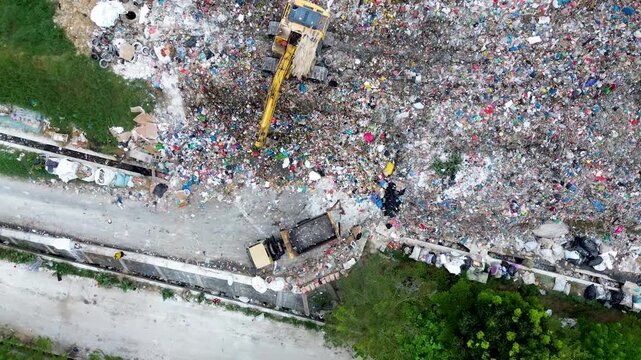 Aerial of landfill highlighting plastic waste pollution and environmental impact of global sustainability crisis