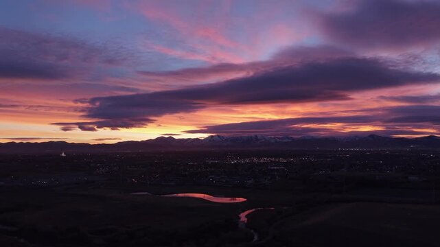 Aerial view of purple and orange sunset sky over Midvale Utah
