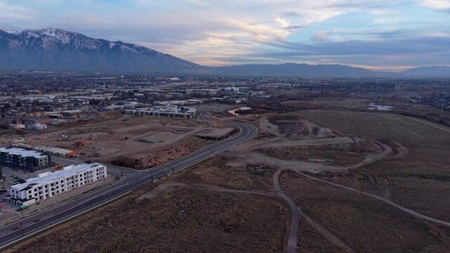 Aerial view of construction site and mountains in Midvale Utah