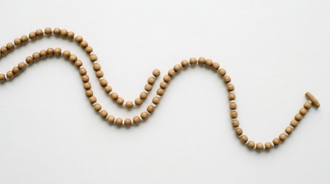 Photo of Beaded Wooden Necklace on White Background with Elegant Natural Style