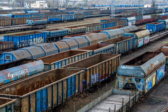 Warsaw, Poland - April 04, 2026: Various PKP Cargo freight wagons at the Warszawa Torunska railway siding