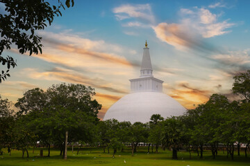White Buddhist Ruwanwelisaya stupa at sunset in Anuradhapura, Sri Lanka