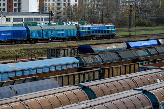 Warsaw, Poland - April 04, 2026: Various PKP Cargo freight wagons at the Warszawa Torunska railway siding