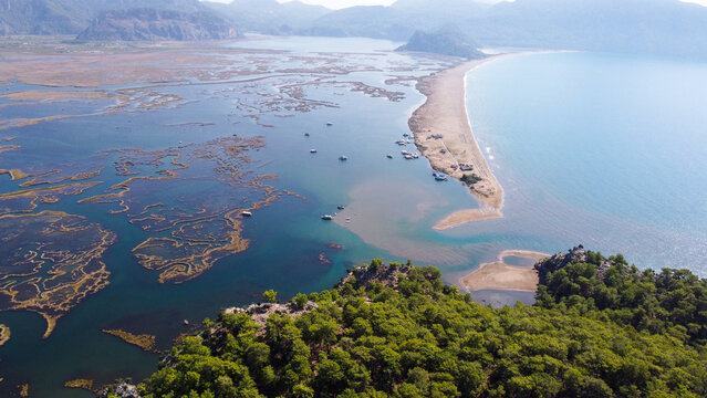 High Angle Aerial View of Iztuzu Turtle Beach and Dalyan Delta with Turquoise Sea and Mountains in Mugla Turkey
