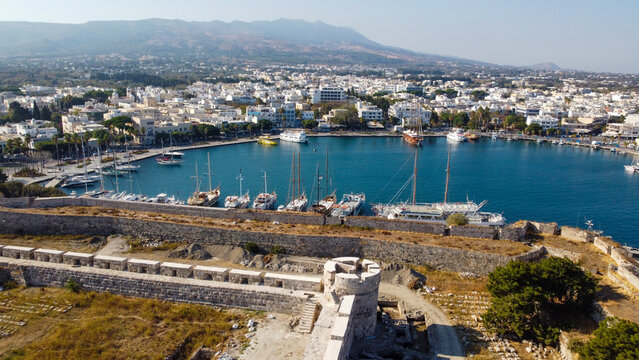 Aerial High Angle View of Historic Neratzia Castle Walls and Ancient Harbor in Kos Town Greece