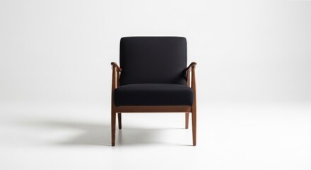 Fototapeta premium Elegant Black Armchair on White Background - Modern Furniture Design.