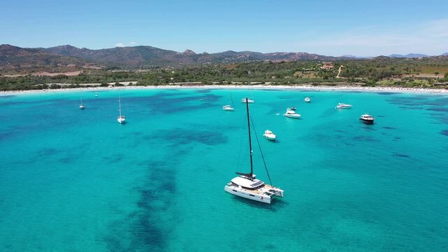 4K Aerial View of Cala Brandinchi SARDINIA  , Lu Impostu Bays. Cinematic aerial Drone Flight over Little Tahiti Turquoise Sea and White Sand. San Teodoro  Best beaches of Sardegna and Europe tahity 4k
