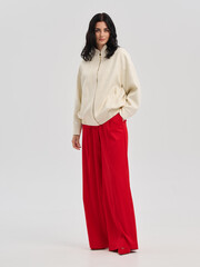 Naklejka premium Fashion shooting in studio . Professional model , fashionable clothes and style, new collection. stylish look