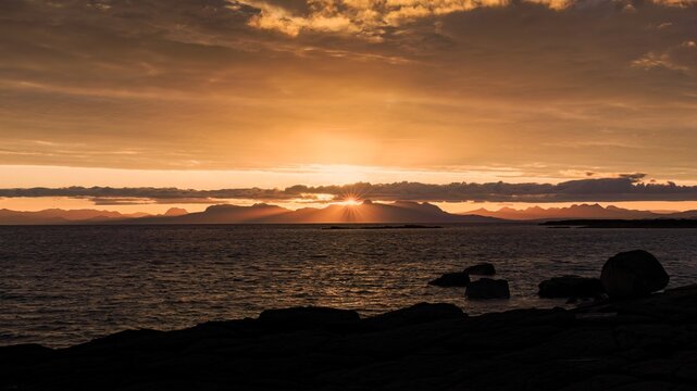 Sunrise over the North Atlantic Ocean from An Corran Beach Car Park on Isle of Skye in Scotland, UK