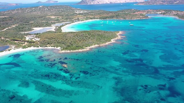 4K Aerial View of Cala Brandinchi SARDINIA  , Lu Impostu Bays. Cinematic aerial Drone Flight over Little Tahiti Turquoise Sea and White Sand. San Teodoro  Best beaches of Sardegna and Europe tahity 4k