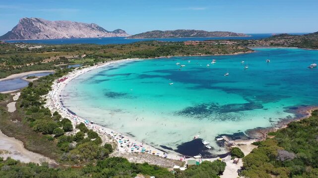 4K Aerial View of Cala Brandinchi SARDINIA  , Lu Impostu Bays. Cinematic aerial Drone Flight over Little Tahiti Turquoise Sea and White Sand. San Teodoro  Best beaches of Sardegna and Europe tahity 4k