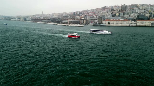 Istanbul/Turkey circa 2023: two ferry boats at the shore if Istanbul