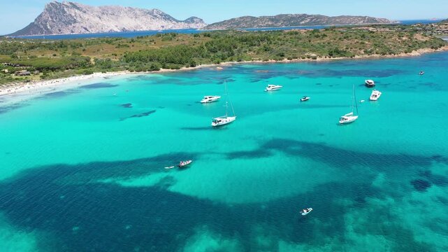 4K Aerial View of Cala Brandinchi SARDINIA  , Lu Impostu Bays. Cinematic aerial Drone Flight over Little Tahiti Turquoise Sea and White Sand. San Teodoro  Best beaches of Sardegna and Europe tahity 4k