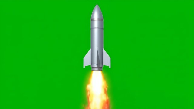 A silver rocket ship ascending with bright orange flames erupting from its base against a green screen background