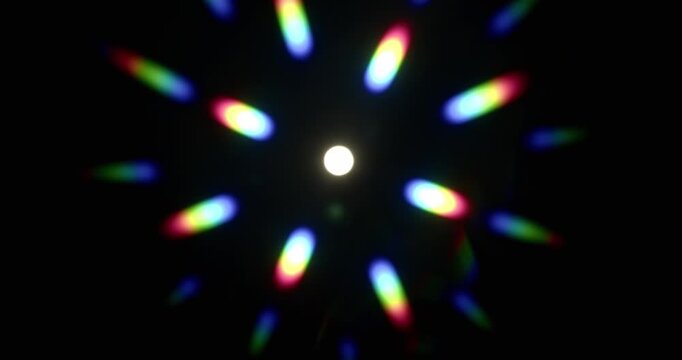 Light diffraction shining through prism creating a rainbow of light leaks in a seamless loop. Optical effect of a light refraction creating chromatic aberration in a spectrum colors. Loop
