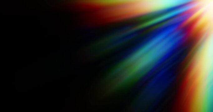 Light shining into a prism creating lens flare in a vivid rainbow of random dancing light rays. Optical effect of a light refraction creating chromatic aberration in a spectrum colors. Loop