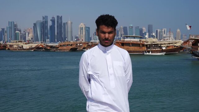 Man standing with futuristic cityscape in Middle East