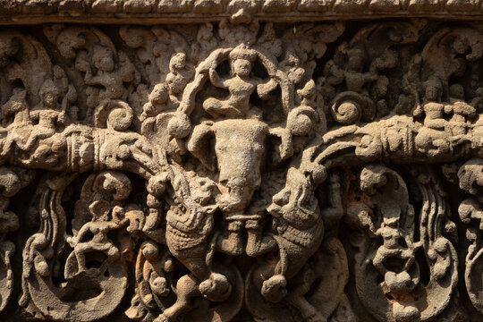 Ancient stone carvings show intricate figures and creatures, Pre Rup, Angkor, Cambodia