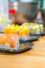 Nikkei salmon, mango, and avocado maki rolls © Guillermo Spelucin