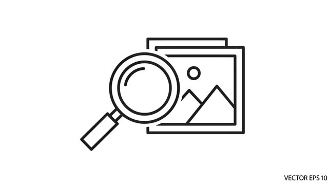 Magnifying glass over stacked images of mountains and sun