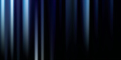 Obraz premium Abstract Vertical Blue Light Streaks on Black Background.
