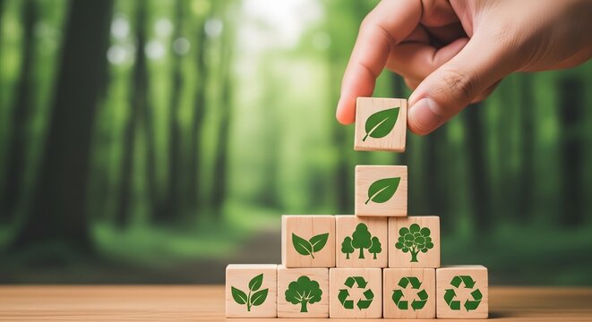 Sustainable growth concept wooden blocks with leaf prints stacked in a lush forest setting
