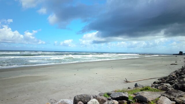 Stormy Tropical Beach With Rocky Shoreline
