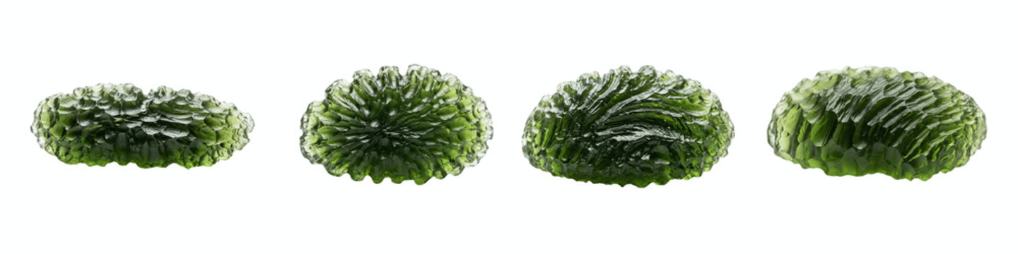 Collection of four green moldavite gemstones isolated on black background