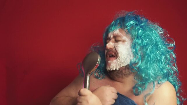 Funny fat man in a blue wig