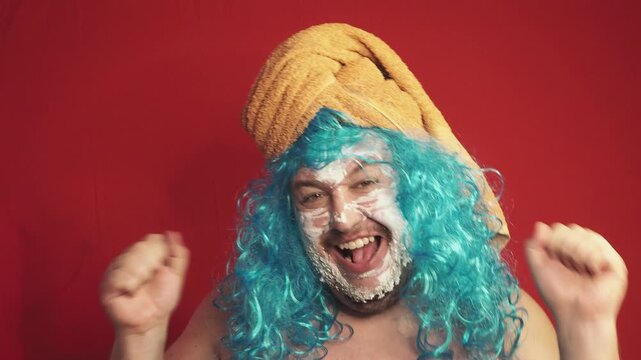 Funny fat man in a blue wig