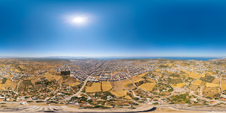 Didim, Turkey. Spherical panorama of the ancient Temple of Apollo, an oracle sanctuary with Medusa columns, city, fields and Aegean Sea on a summer day. Panorama 360x180. Aerial view