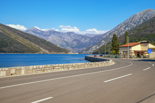 Balkan road trip. Montenegro, Tivat. View of Adriatic Highway (Jadranska magistrala) and Bay of Kotor near ferry station and turnoff toward Kotor city