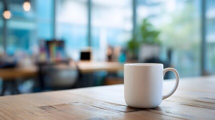 Fototapeta premium Coffee cup on desk with blurred working background