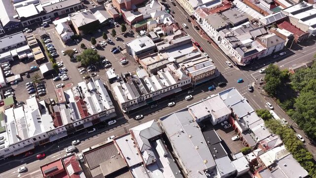 Rooftops of city streets and houses in Launceston downtown aerial urban view to sky.