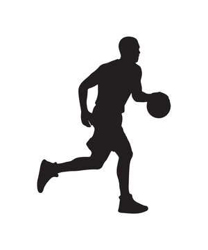 Silhouette of a basketball player dribbling the ball while running on the court.
