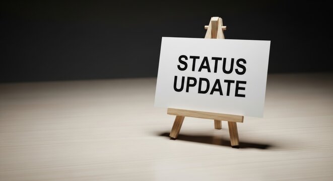 Status Update Sign on Wooden Easel for Business Communication Announcement