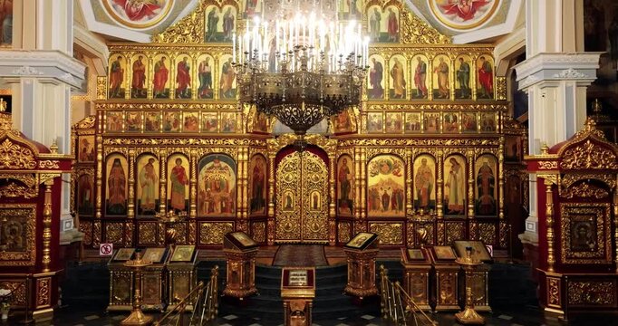 Cinematic Forward Movement Towards Chandelier in Church