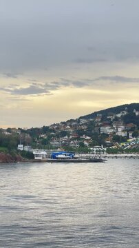 Princes Islands coastline seen from the sea at sunset, Sea of Marmara ferry view, Istanbul, Turkey