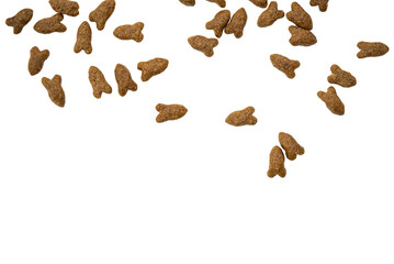 Scattered brown dry pet food kibble pieces isolated on Transparent background, top view with copy space for packaging or pet nutrition concept. © Mukta