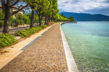 Great waterfront walkway and Lake Garda, Toscolano Maderno, Lombardy, Italy