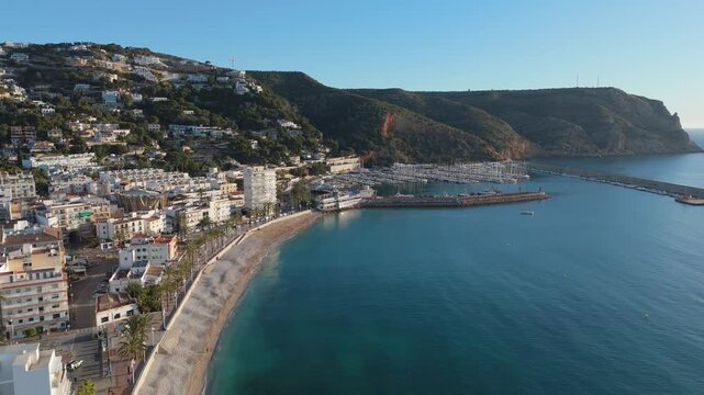 Drone flying over javea town in alicante, spain coast