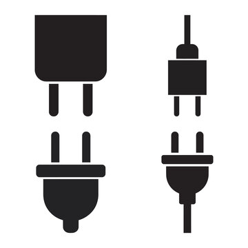 Two pairs of electrical plugs and sockets connecting.