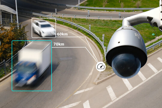 Speed camera surveillance system detecting vehicles on highway road with tracking boxes and speed data overlay