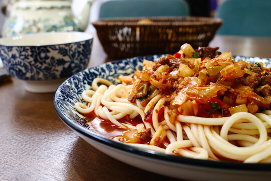 Uyghur suiru lagman noodles with meat tomato vegetable sauce