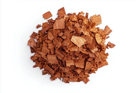  Pile of natural cedar mulch made of fine wood pieces isolated on white background.