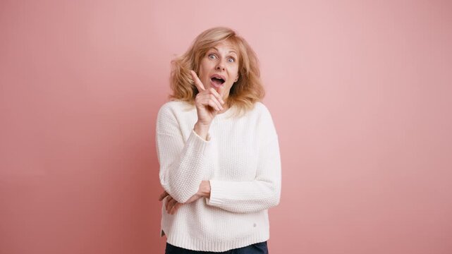 Thoughtful mature woman looking for a solution, finally finding it, and then showing a range of positive and negative emotions