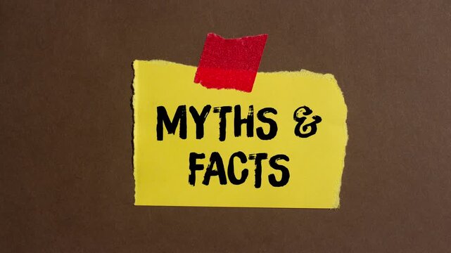 Myths and facts message writing on ripped torn paper background