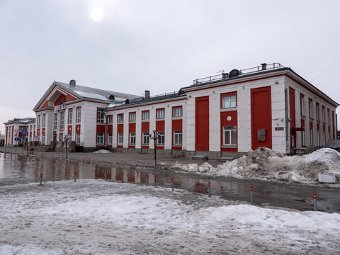 March 22 2026 Barnaul Russia railway station building covered in snow cold early spring cityscape urban architecture and winter atmosphere.