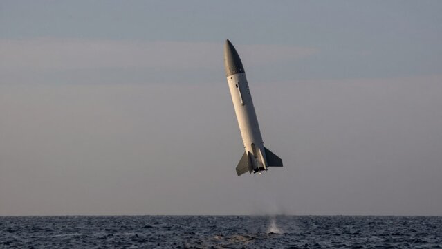 Taken low angle looking rocket taking launch pad center frame sleek cylindrical shape pointed nose clearly vis